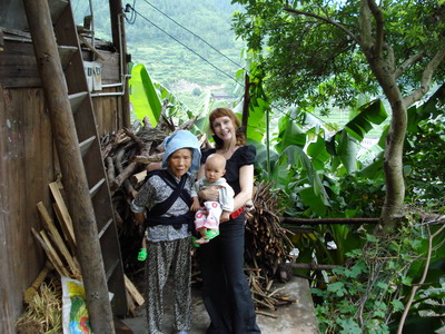 With a Miao Grand-mother and baby twins in Guizhou Province