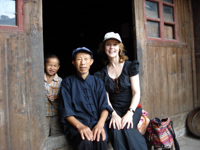 With a Miao man and his grand-son